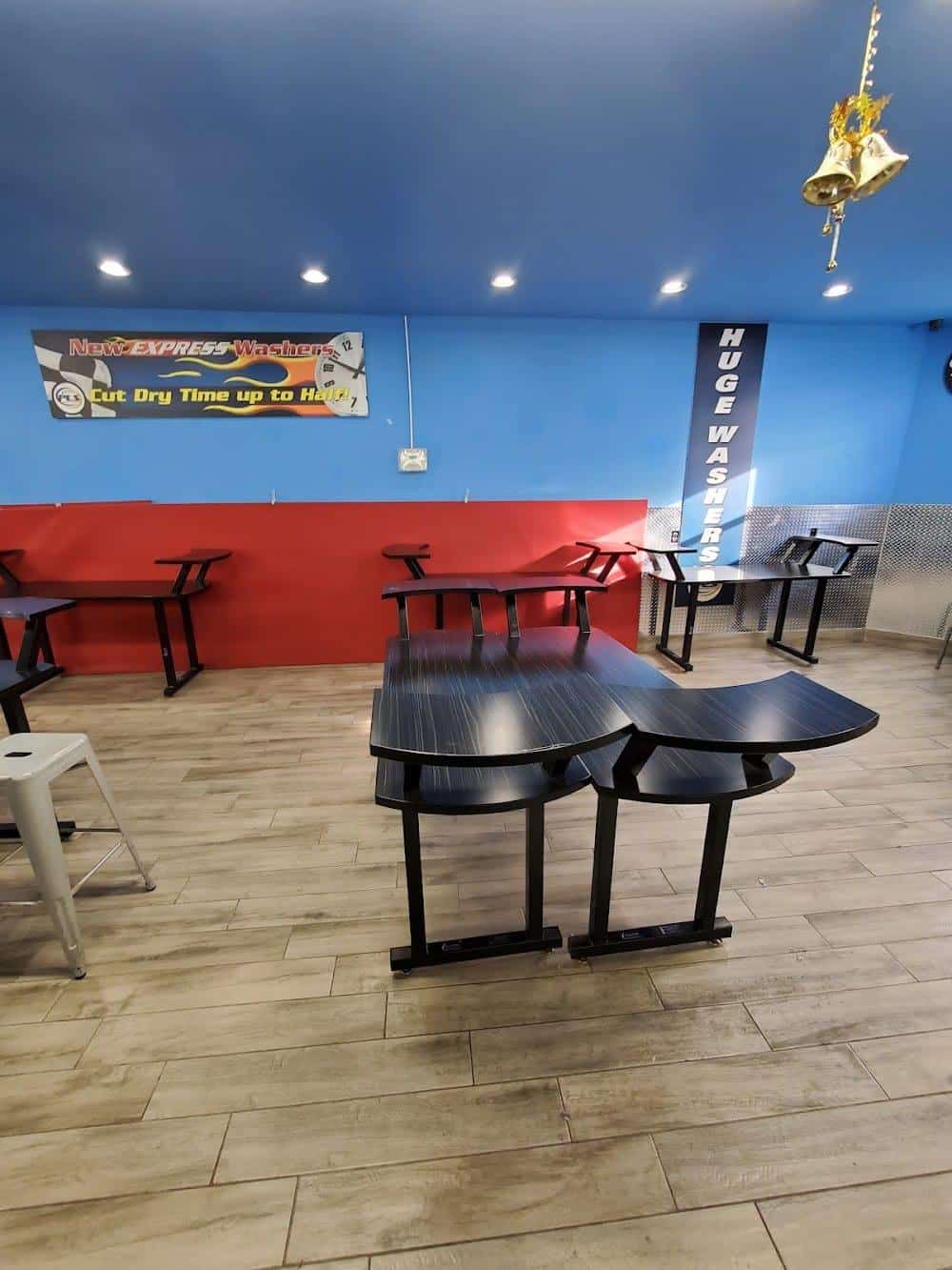 Self service laundromat near me - customer seating area at a Dirty Laundry Express in New Jersey