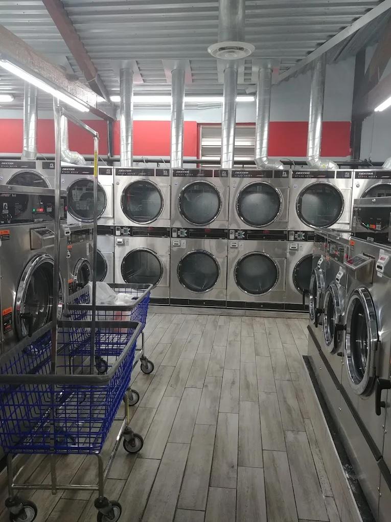 Wash and fold near me - dryer wall and laundry carts at a Dirty Laundry Express in New Jersey